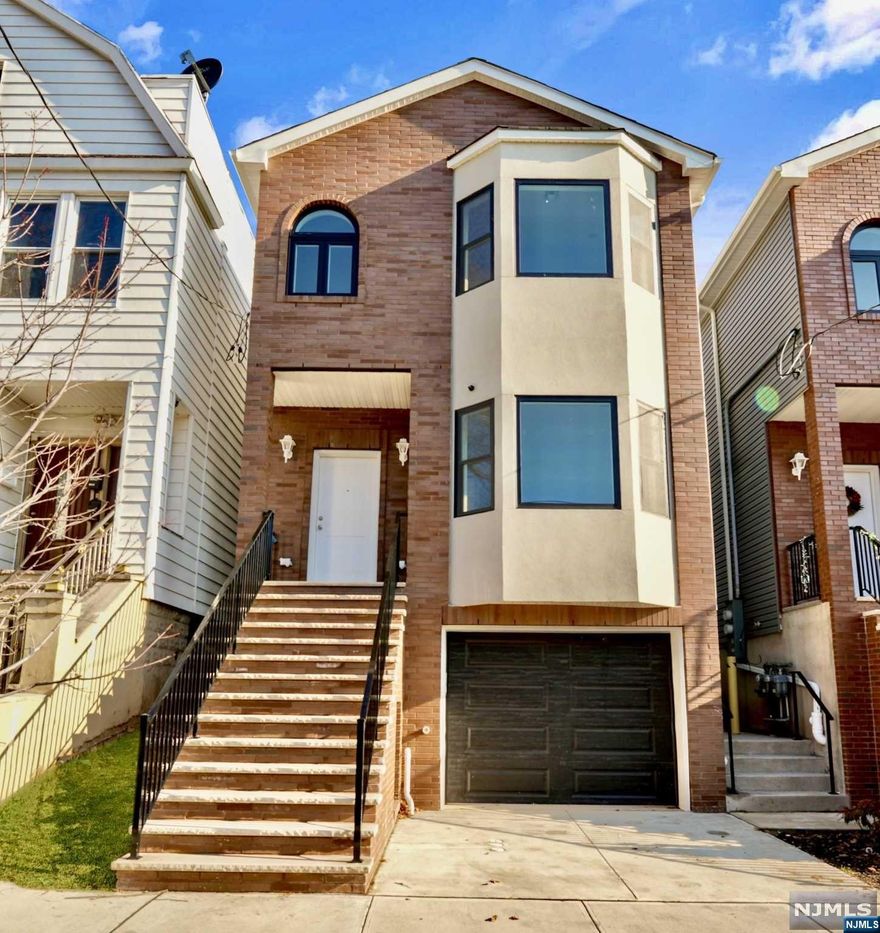 Let's welcome this custom brand new construction Two-Family in Jersey City. With it's sister multi-unit just recently sold, Don't wait to lose out on this opportunity. This beauty awaits the perfect investor or multi-generational family. With no expenses spared, each unit features- an oversized bay-window providing perfect natural light entry, 4 white oak hardwood flooring, decorative moldings, modern day eat-in kitchen w/ shaker white cabinetry, quartz countertops, and stainless steel appliances. All bathrooms are primed w/ all white finishes to allow your own preference of color pop. Each unit consists of 3 bedrooms and 2 full bathrooms. Ground level consists of an additional 1/2 bath, 2 car-deep garage, & bonus room leading out to the perfect-sized yard for contemporary entertainment. Located near House of worship, shopping, restaurants, parks, & transportation. Easy access & close proximity to New York City.
