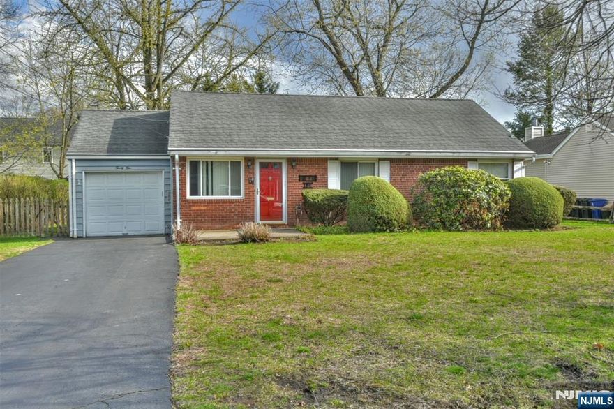 Location! Location! Location! Original owner since 1951. One floor living. Near county park and NY bus. Buyer responsible for all town permits and inspections. Hardwood floors as installed. Beautiful family room with wood burning FP. Roll-in shower. Great alternative to condo living. As-is condition. A diamond in the rough.