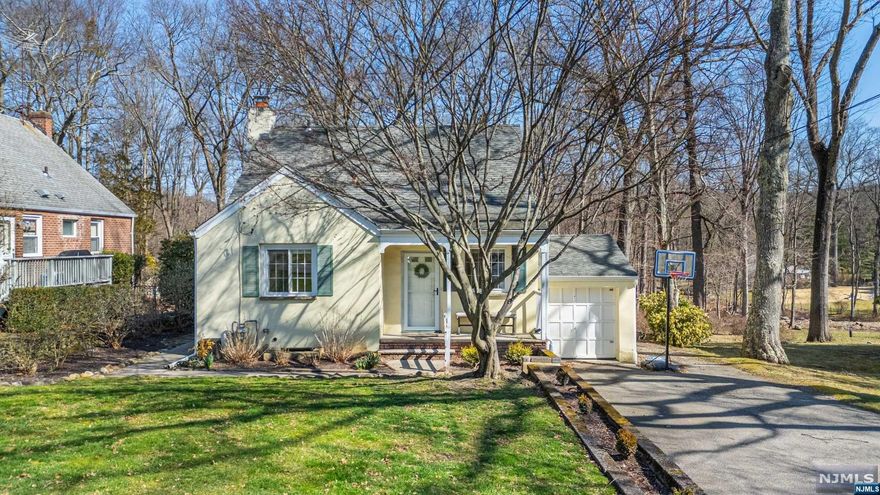 Amazing property and wonderful opportunity in sought after desirable neighborhood. Highlighted features include: Welcoming front porch with charming living room and dining room. Kitchen with stainless steel appliances and endless potential. First floor also includes: generously sized primary bedroom, additional bedroom and full bathroom. Second floor: two nice size bedrooms with ample storage. Incredible walk out basement with recreational area, play room, office area, power room and laundry area. Options are endless based on layout and lifestyle. All leading to the outdoors with over a third acre of stunning property with privacy, a patio, fire pit area and shed. Perfect for all your outdoor needs and enjoyment. There is a one car garage, hardwood floors, and newer windows. This home has been well maintained. Situated in a great, convenient location. Excellent school system. Minutes to schools, shopping, restaurants and major highways for commuting. You will fall in love!