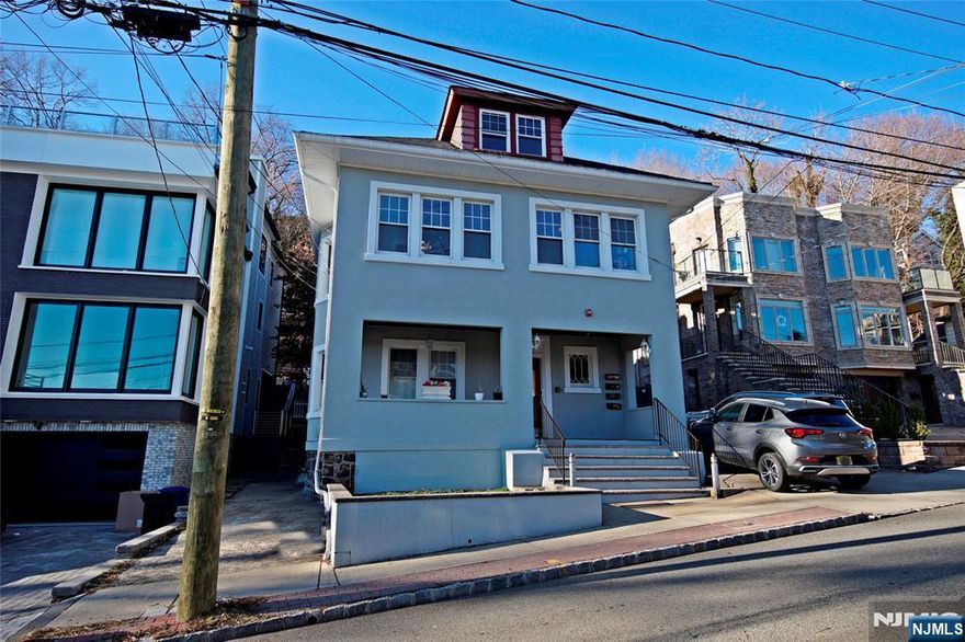 Large 2 bedroom 1 bathroom apartment located in the heart of Edgewater. Hardwood floors, eat in kitchen with new dishwasher, living room and dining room, full bath, laundry in unit and use of front porch. Rent includes heat, hot and cold water. Walking distance to Edgewater Ferry, shops, library and schools. A pet will be considered. 1 off street parking space available for a fee. Don't miss out.