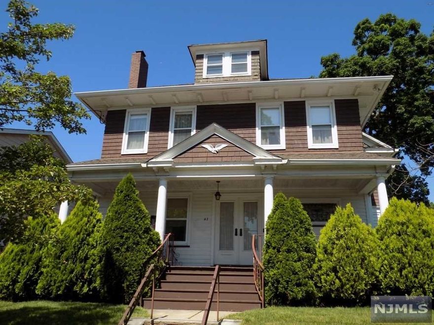 Come see this very well maintained center hall colonial in the White Oaks section, one of the most sought after streets in Belleville. Charming craftsman style home, gorgeous woodwork throughout, hardwood floors preserved under carpet. First floor features den with stain glass window, a cozy living room with a gas fireplace, spacious dining room with built-in and stain glass window, large eat-in-kitchen with door access to yard and patio. Second floor, 4 large bedrooms with closets, 1 full bath, built-in in hallway, walk up finished attic with view of NYC. Full basement with full bath, 1 car garage, central air conditioning, schools, shopping and transportation are very close