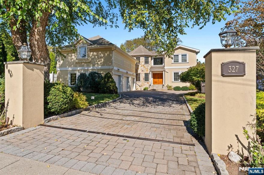 Rare opportunity to own this beautiful, expansive custom-built residence offering approximately 8,000 square feet of living space, set on a sprawling, park-like .83-acre lot in the heart of Paramus. This home offers the perfect blend of elegance, comfort, and modern convenience.The sun-filled main level showcases open-concept living and dining areas, ideal for entertaining and everyday living. A chefâ€™s kitchen anchors the home with abundant cabinetry, radiant floors, and generous prep space, flowing effortlessly into a welcoming double-story great room and outdoor retreat. Step outside to your private backyard oasisâ€”complete with a custom outdoor kitchen with pergola, covered entertaining area, and sparkling in-ground pool surrounded by mature landscaping. Whether hosting summer gatherings or relaxing under the stars, this space truly elevates indoor-outdoor living. Upstairs, youâ€™ll find four generously sized bedrooms, including a primary suite with spa-style bath, gym/sitting room, and ample closet space. Additional highlights include a finished lower level with a basketball half court, multiple living areas, full-home generator, and 3-car attached garage. Located minutes from Paramusâ€™s top-rated schools, shopping, dining, and NYC transportation, this property delivers resort-style living with suburban convenience. A rare findâ€”spacious, move-in ready, and designed for year-round entertaining.