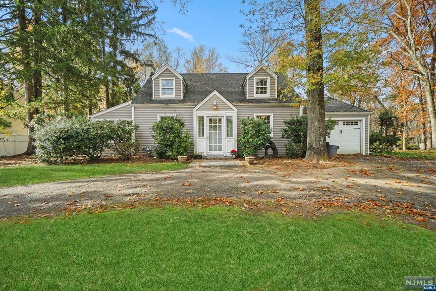 Welcome to this captivating, renovated Cape Cod, bathed in natural light and featuring an open floor concept seamlessly blending modern style with classic charm. On an oversized .6198-acre property with a circular driveway, enjoy the elegance of granite kitchen countertops. Two bedrooms on the second floor provide comfort, while the ground level offers a versatile space as a third bedroom or home office. The enclosed porch, flooded with natural light, is perfect for relaxation. With thoughtful design, modern updates, and a perfect indoor-outdoor balance, this Cape Cod offers a lifestyle, not just a home. Welcome home!