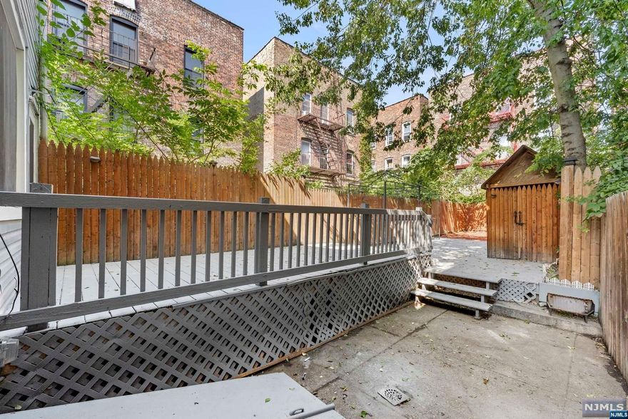 Welcome to this newly renovated two story home, located less than 5 minutes walking distance to downtown Jersey City, Journal Square, Mcginley Square, the Jersey City Waterfront where the best restaurants and shopping areas are, and lets not forget 4 blocks away from Saint Peters College. You're literally in the heart of Jersey city, prime location, at the same time being only 10 Minutes from NYC and all major highways including the turnpike, garden state parkway, RT 1&9, RT 280, Holland Tunnel, Lincoln tunnel and the Bayonne Bridge . The Property Features 3 spacious bedrooms, renovated kitchen, 1 and a half bathrooms with a finished basement, also the backyard is a hidden gem in the neighborhood, with a huge deck and fence for privacy. The family room has a 10ft fireplace tiled from floor to ceiling.