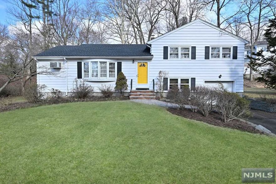 A great opportunity knocks! For a home on a terrific cul de sac in the fabulous town of River Vale! Large split level home was expanded making a huge living rm & banquet size dining rms ready for your dinner parties and entertaining for your family & friends!! 3 BRs 1.5 baths, hardwood flrs, newer roof, and a great ground flr bonus rm for home office, play rm, gym or more! Great size backyard is ready for your upcoming spring and summer BBQs & outdoor fun! And Split Level homes can always add-a-level over the living rm! This home has incredible potential, and will always be on one of the best streets in town! Oil tank is above ground and in the garage - can be easily converted to gas :) Dont miss this opportunity !!!