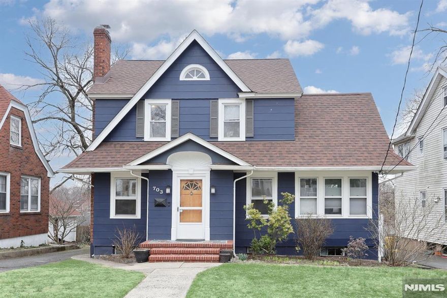 Welcome to this beautifully maintained Center Hall Colonial blending timeless charm with modern updates and flexible living space. The sun-filled eat-in kitchen features stainless steel appliances including a Bosch dishwasher, 36" LG double smart oven, and Samsung smart refrigerator. A formal dining room is perfect for entertaining, while the living room offers a cozy wood-burning fireplace. A spacious main-floor office, ideal as a sunroom or den, adds valuable versatility. Upstairs features three generously sized bedrooms and an updated full bathroom with a soaking tub. The primary bedroom includes a large walk-in closet with potential for a private office, nursery, or hobby room. The finished third-floor attic with an egress window provides additional living space for a guest room, playroom, or studio. The dry, unfinished basement offers abundant storage, a laundry area w/ sink, a convenient toilet stall, and unlimited potential for finishing-whether you envision a recreation room, gym, workshop, or expanded living space. Outside, a long driveway fits up to five vehicles and includes a 2-phase EV charger, leading to a detached two-car garage. The fully fenced yard creates a peaceful outdoor haven, and the deck is the perfect place to unwind and enjoy warm summer evenings. Conveniently located near shopping, schools, houses of worship, and NYC transportation. A rare blend of classic architecture, thoughtful updates, and flexible spaces - ready to welcome its next owner.