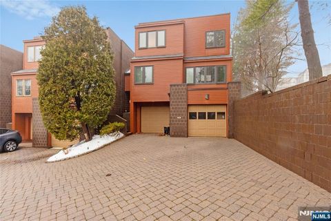 Photo of 55 Hidden Ledge Road, Englewood, NJ 07631 (MLS # 26013022)