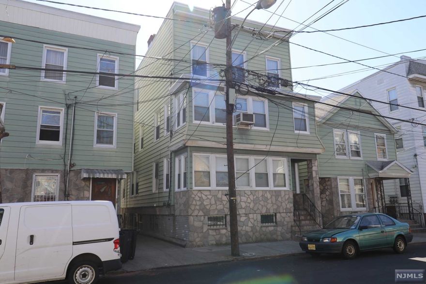 WELCOME TO THIS RARE INVESTMENT OPPORTUNITY!!! â€œPackage Dealâ€ three /3 Family and one Two Family home, total 11 Apartments plus â€œ8 Car Garagesâ€ and 3 parking spaces been sold as is conveniently located in the sought-after section of Ironbound, Everything is just steps from your door the Ironbound Restaurants/Ferry Street and Shopping Stores /Nightlife, and close to all major Highways and public transportation, Newark Penn Station with "EASY NYC COMMUTE "all separated utilities Baseboard Package deal t 2 family home ) 3 family homes Walnut Street one share Driveway for all Garages and parking spots