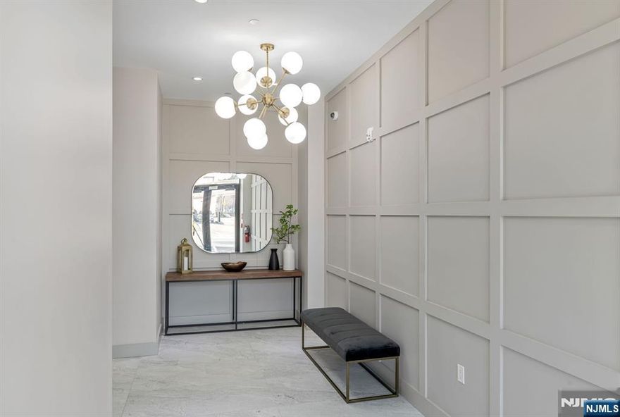 Boutique luxury living steps from the train and all downtown Westwood has to offer. Customized to provide flexible live and work options while never compromising on style. This loft style unit features modern eat-in kitchen, living room, bedroom with ample closet space, and stylish bathroom. Rooftop deck and community lounge are added benefits.