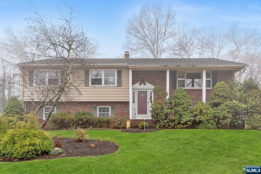 2000+ sq.ft. home situated on a level 1/2 acre lot on a cul-de-sac in beautiful North Haledon! Many updates including the baths and kitchen. Amenities include: central a/c, rear enclosed sunroom, living room fireplace (gas), inground sprinklers, multi zone gas hot water baseboard heat, attic storage as well as an outdoor storage shed. Great set-up for multi-generational living. Exquisite location! This is a home that you will drive up to and say: "this is exactly what we have been looking for". Paradise found!