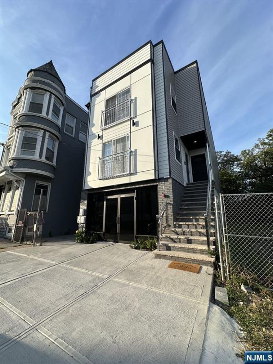 Opportunity to own a multi-family property with strong value-add potential in Newark. The property features 9 bedrooms, 3 bathrooms, and a full basement, with existing plans for a potential 3-family conversion (buyer to verify all approvals and zoning). The ground floor space offers flexibility for possible residential conversion or garage use. The property is being sold as-is and requires renovation. Notable conditions include missing tiles in the first-floor bathroom, and on the third floor, a hole in the exterior trim, a hole in the wall, discoloration under the living room window, a missing bedroom wall, and prior ceiling discoloration in the living room. Buyer is responsible for all inspections, certifications, and approvals.