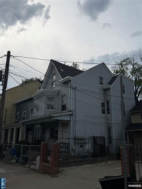 Photo of 141 Park Avenue, Paterson, NJ 07501 (MLS # 26019465)