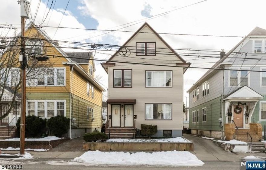 Well-maintained two-family home located in Clifton, NJ. Each unit offers 2 bedrooms and 1 full bathroom, providing a functional and comfortable layout. The property features separate living areas, making it suitable for owner-occupants or investors. Conveniently situated near major highways, public transportation, and local amenities, with easy access to New York City and close proximity to the American Dream Mall. A solid opportunity in a desirable Clifton location