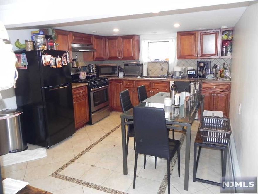 THIS 2 FAMILY HOME HAS SOME GREAT POSSIBILITIES...THE 1ST FLOOR UNIT FEATURES A LIVING ROOM, FORMAL DINING ROOM, EAT IN KITCHEN, 2 BEDROOMS AND A FULL BATH. THE 2ND FLOOR APARTMENT FEATURES A LIVING ROOM, EAT IN KITCHEN, BEDROOM, ANOTHER ROOM THAT CAN BE MADE INTO A BEDROOM, A BONUS ROOM OFFICE/PLAY AND A FULL BATH. THE BASEMENT CAN BE USED FOR EXTENDED FAMILY AND FEATURES A LIVING ROOM, SUMMER KITCHEN, BEDROOM, BONUS ROOM BEDROOM PLAY/DEN/OFFICE, FULL BATH. THE BASEMENT ALSO HAS A LAUNDRY AND UTILITY AREA. THERE IS ALSO A 2 CAR GARAGE AND A LARGE DRIVEWAY THAT YOU COULD PARK 6 PLUS CARS ALONG WITH A 2 CAR GARAGE. WALL AND WINDOW A/C. ALL APPLIANCES STAYING. HOUSE IS BEING SOLD AS IS. THE HOT WATER HEATER IS 1 YEARS OLD. THE FURNANCE IS 2 YEARS OLD. CLOSE TO SCHOOLS, HOUSE OF WORSHIPS, SHOPPING AND NYC TRANSPORTATION AND MORE.