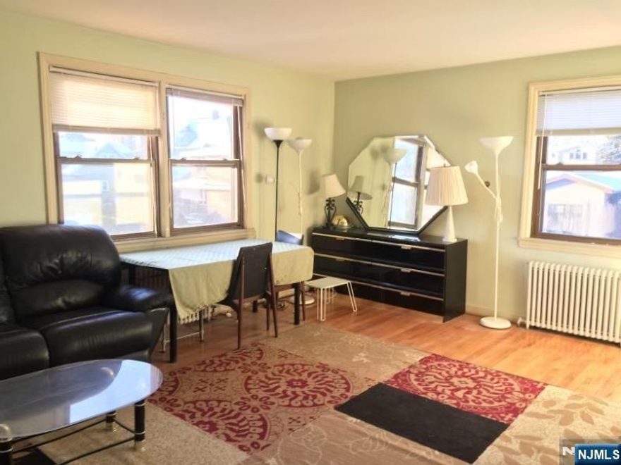 Top-floor, bright 2-bedroom condo with a modern layout and updates throughout. Spacious living room with hardwood floors, perfect for relaxing or entertaining. The sunny eat-in kitchen offers newer stainless-steel appliances â€” refrigerator, gas oven, microwave, and dishwasher â€” along with plenty of cabinets and counter space. Renovated bathroom and large windows bring in great natural light. Excellent location â€” just steps to the Columbia University shuttle, and close to schools, shops, restaurants, and NYC transportation.