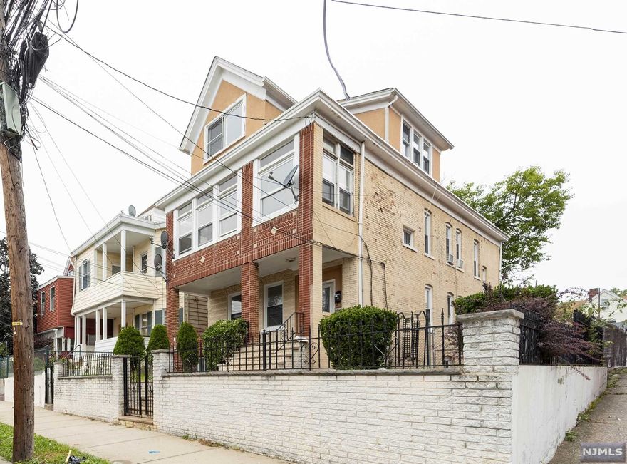 Large, Move In Conditions, Well Kept Brick 2 Family Home with 3 Bedrooms per Unit, Finished Attic, Semi Finished Basement & Detached Garages w/ Newer Roof, Low Taxes & Separate Utilities. Share Driveway to Access Rear Garages. 1 Garage Rented $100.00 month to month. 1st Floor Vacant & 2nd Fl Tenant Occupied.