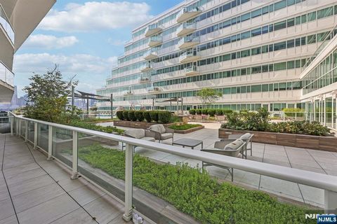 Photo of 800 Ave At Port Imperial #308, Weehawken, NJ 07086 (MLS # 25026438)