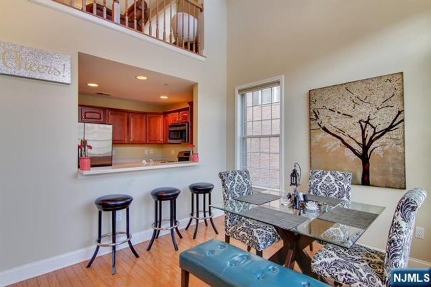 Endure in a lavish and visually stunning Chatham style home featuring 2 bedroom, 2 full bath, one half bath, and a loft area. Extremely rare corner unit boasting high ceilings, hardwood floor, and recessed lighting on a private street. This sprawling home gratifies everyday comforts stretching across 1764 sqft. A complete master suite with Jacuzzi spa-like bath, huge walk in closet and a balcony. Second bedroom is very spacious and on same level as master bedroom. An in home washer/dryer and garage parking make this home a complete! Located in Bulls Ferry, this community offers 2 pools, Jacuzzi, 24hr security, children's playground, and free shuttle to/from Ferry.