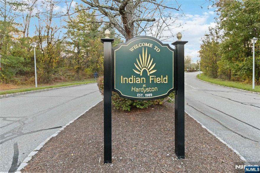 Fall in love with this beautifully updated end-unit townhome in the desirable Indian Field community! Offering three levels of living and a finished walkout basement with endless possibilities, this home blends comfort, style, and thoughtful updates throughout. The main level features a bright living and dining area, new hardwood flooring (2023), fresh paint, and new blinds (2024). The kitchen offers granite countertops and sliders that open to a private deckâ€”perfect for relaxing or entertaining. Upstairs youâ€™ll find a beautifully renovated ensuite and spacious bedrooms, while the finished lower level (2023) adds a recreation room, full bath, bedroom, and extra storage. Additional upgrades include a refreshed laundry area (2023) and whole-house water filter and softener system (2024). Major systems were replaced in 2022, including the roof (covered by HOA), furnace, A/C, and water heater. Enjoy community amenitiesâ€”pool, clubhouse, tennis and basketball courts, gazebo, playground, and more. Close to skiing, Blue Ribbon Schools, and major roadways for easy commuting. Nothing to do but unpack and enjoy! 1st OPEN HOUSE SUNDAY OCTOBER 19, 2025 12-3PM