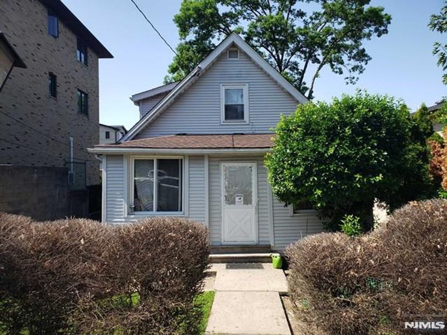 Cape Cod on 40 x 100 Lot in Palisades Park, Builders are Welcome, Build a New House or Fully Renovate. 1FL: Enclosed Front Porch, Living Room, Dining Room, Kitchen, BR, Full Bath, Laundry, Deck. 2FL: 2BRs, Half Bath, Storage Room. Finished Basement, Separate Entrance, Family Room, Summer Kitchen, BR, Bath, Laundry, Utility. Nice Back Yard, Conv Located Close to Shops, Restaurants, NYC Bus, Close to GW Bridge and All Major Highways( Rt. 46, 95 & 80 ). Property is being sold As-is.