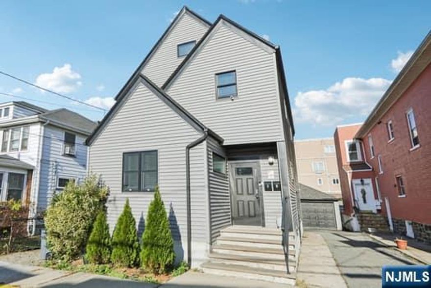 Location, Location, Location, Laird Place just off Palisade Avenue and overlooking Edgewater , this home is minutes from Local shops, restaurants, Quick Access to George Washington Bridge and Multiple NYC-bound transportation. Gorgeous well maintained Two-Family Home featuring a private detached two-car garage, driveway and a charming backyard. First Floor Unit offers an open-concept living room and kitchen, filled with natural light. 2 bedrooms, 1 bath and hardwood floors throughout. A modern kitchen with granite countertops, stainless steel appliances and plenty of storage. A large basement level with a utility room, laundry area, and an oversized bonus rooms and private walkout access. Second & Third Floor Enjoy a bright and charming duplex with beautiful views of the New York City skyline. Main level offers an open-concept living room, Kitchen and dining room. A modern kitchen with granite countertops, stainless steel appliances with plenty of storage.1 bedroom with closets and 1 full bath. Plenty of windows offering amazing natural lightThe upper level offers 2 additional bedrooms with closets. Schedule your showing today!