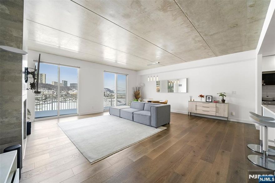 Experience luxury living in this fully renovated penthouse at The Admiral's Walk a prestigious gated community offering unmatched elegance and amenities. This sophisticated residence features sweeping views, hardwood floors, and grand 9-foot ceilings. Enjoy a full suite of amenities including a 24-hour concierge, fitness center with Hudson River views, clubhouse for entertainment, picnic areas, sauna, tennis and basketball courts, and shuffleboard. The spacious 1-bedroom, 1.5-bath layout provides comfort and style, and is conveniently located within walking distance to the Edgewater Ferry, with NYC transportation just steps away. Shopping and conveniences are nearby, and one dedicated outdoor parking spot #9 is included. $750 NON REFUNDABLE MOVE IN ADMINISTRATION FEE,$400 NON REFUNDABLE LEASE REVIEW FEE, AND $500 REFUNDABLE MOVE IN DEPOSIT. "For Private tour, Text/ CALL to Sunny S. Hwang (Re/Max Now)"