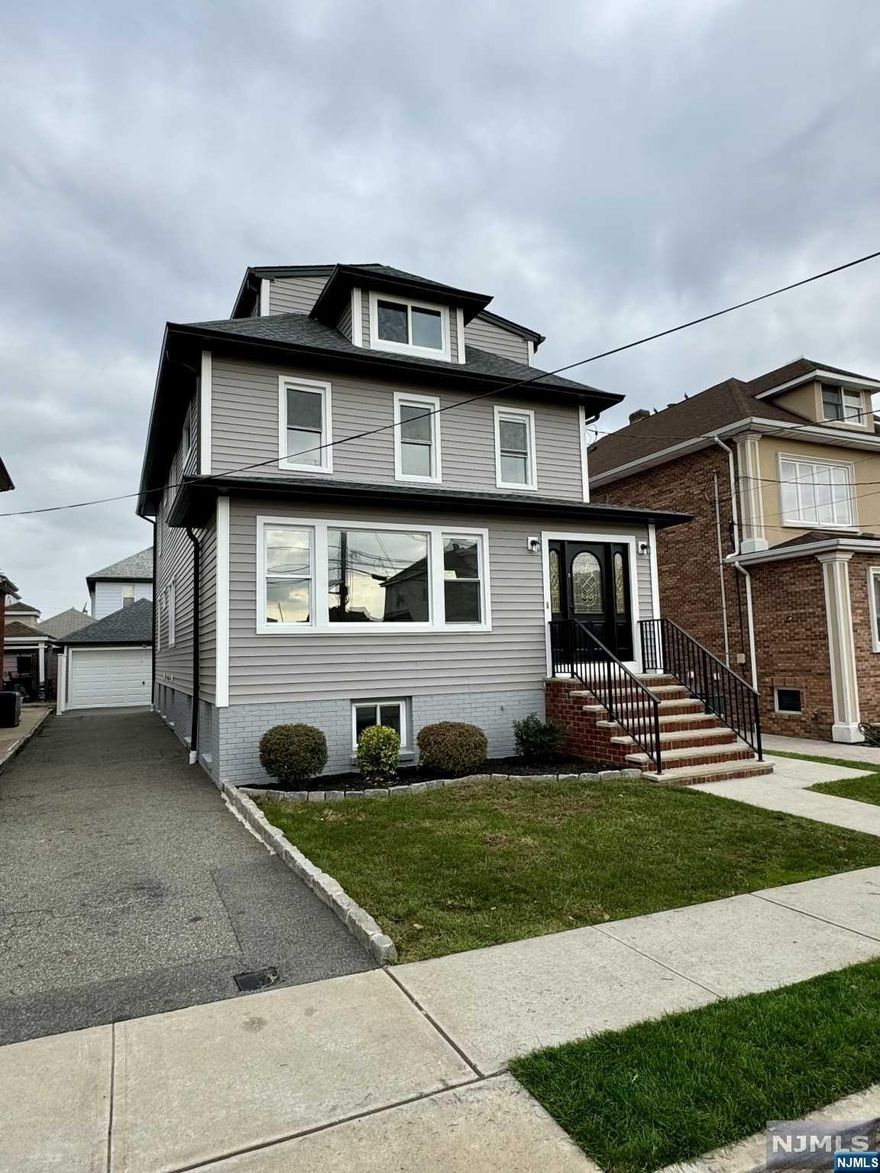 A MUST SEE!!! JUST FINISHED!! COMPLETE UPGRADED RENOVATION, BUILT BY PREMIER BUILDER. WELCOME TO THIS SPACIOUS AND BRIGHT 2 FAMILY COLONIAL HOME WHICH IS NESTLED IN A PICTURESQUE RESIDENTIAL AREA, WALKING DISTANCE TO NYC TRANSIT,SHOPPING,RESTAURANTS, SCHOOLS & PARKS. FIRST FLOOR UNIT WITH BASEMENT HAS A LIVING ROOM, DINING ROOM, 2 FULL BATHROOMS, 3 BEDROOMS, EAT IN KITCHEN, LAUNDRY ROOM, SUMMER KITCHEN, REC ROOM, ACCESS TO SPACIOUS PRIVATE YARD. 2 CAR DETACHED GARAGE WITH LONG DRIVEWAY FOR ADDITIONAL PARKING. THE SECOND FLOOR WELCOMES YOU TO A LIVING ROOM, DINING ROOM, BEDROOM, BEDROOM,FULL BATH, LAUNDRY ROOM,EIN KITCHEN,DEN/OFFICE, PRIMARY SUITE WITH FULL BATHROOM.