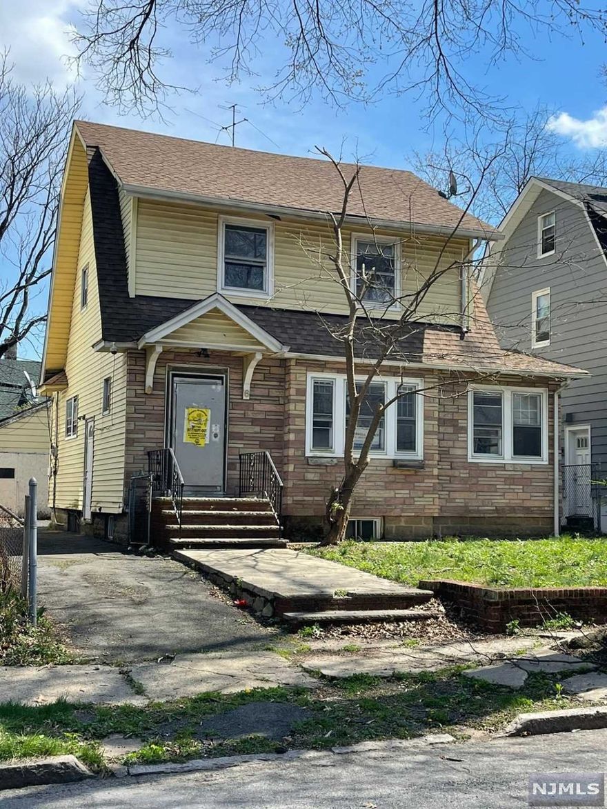 3 bedroom colonial house located in East Orange near Seaton Hall University. The first level layout consists of a den, formal living room w/ fireplace, dining room. Wooden hardwood through out, kitchen and half bathroom. The second floor has three bedrooms all with additional closet space and a full bathroom. A private driveway, two car garage and large backyard. The home is in need of some TLC, updates and repairs. Close to all modes of public transportation and minutes away from I-280 and Garden State Pkwy an easy commute to New York. Signed Buyers Hold Harless & release regarding covid required before to gain access. The buyer is responsible for all city inspections.