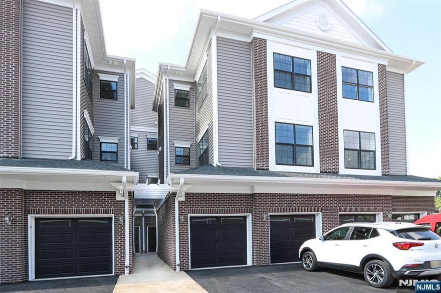 Welcome to The Parke at Little Falls where you will experience the perfect blend of comfort, convenience, and modern living. This spacious Hampton style unit offers an open concept living area with engineered wood flooring throughout. The kitchen is complete with quartz countertops, shaker style soft close cabinets, and GE stainless steel appliances. Upstairs you'll find three bedrooms with walk in closets, the primary with ensuite, an additional full bathroom, laundry area, and a versatile loft space. Other features include ample closet space, a one car built in garage, tankless water heater, and Ring security system. The Parke is situated in a prime location, this community is just moments away from restaurants, shopping, highways, and schools. Enjoy seamless commuting with NJ Transit right outside the community, and the Little Falls Train Station and Willowbrook Park and Ride located nearby. Tax amt. shown reflects 25% red. from 30yr tax abatement. Photos virtually staged.