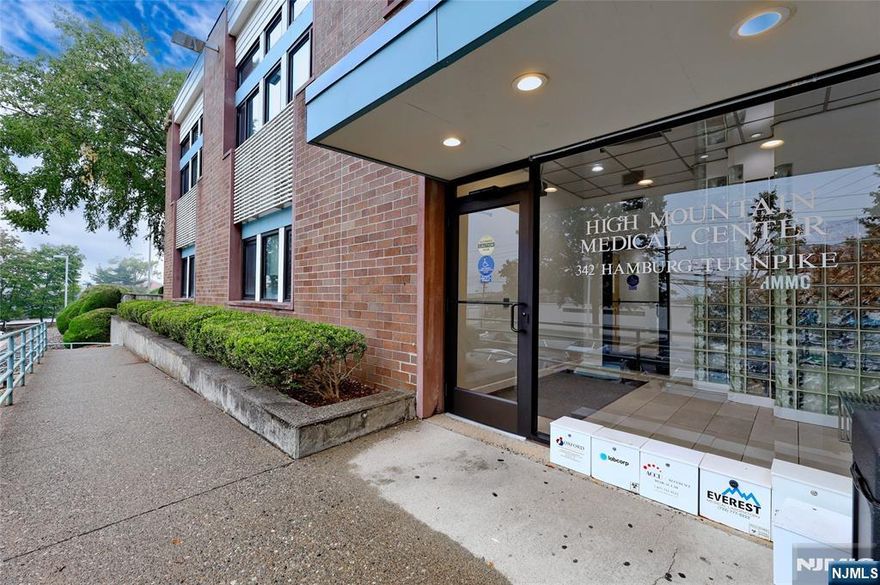 Large Medical Building, Bright atrium skylit 1st floor medical (physical therapy) space. Large waiting area, private business office, staff break room, has laundry facility in unit. 6 treatment areas, open gym, Located near St. Joe's Hosp, Lots of parking, Handicap access, owner willing to negotiate fixtures, furniture & gym equipment. Monthly maintenance is $1442.80. Available immed. See layout attached