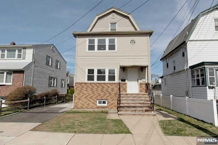 Beautifully renovated second-floor apartment with direct access to a fully finished attic, offering exceptional extra space and storage. Enjoy hardwood floors throughout both levels, central air, and a dedicated laundry room complete with washer, dryer, and a quartz countertop that complements the updated kitchen. The kitchen features sleek quartz surfaces and stainless steel appliances for a modern, fresh look. The second-floor tenant has exclusive use of the outdoor shed for additional storage, and the backyard is shared with the first-floor tenants. Conveniently located just one block from the bus rest area on Ridge Rd. Call today to schedule your private showing.