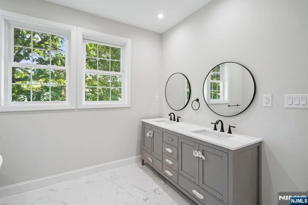 Photo of 81 Eastbrook Drive, River Edge, NJ 07661 (MLS # 25040392)