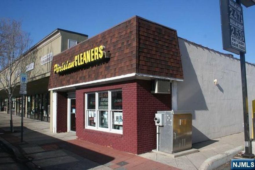 Great Location, the heart of Cedar Lane. High traffic area with sidewalk at side of the building leading to Town Municipal Parking lot. Lower level has ground level walk out. Great Potential for Owner-Occupied business or Existing Tenant may extend their lease with very good rent. Existing business is a Dry Cleaner paying $4500 per month + utils. Phase 1 Inspection is done. Building priced for New Owner to take on responsiblity of the next phase. SOLD "AS IS".