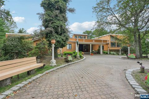 Photo of 16 Schaffer Rd, Alpine, NJ 07620 (MLS # 25025145)