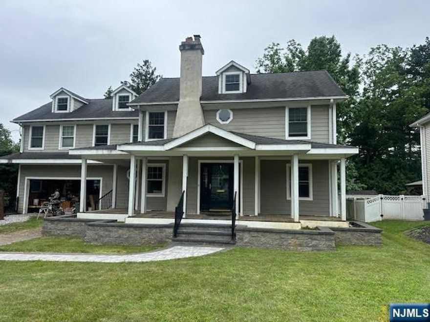 Welcome to this beautiful 4 bedroom home nestled in the charming community of North Caldwell. This spacious residence offers 4 generous bedrooms, each featuring ample closet space to accommodate all your storage needs. The home boasts brand new radiant hardwood flooring through out and tile in the kitchen. Enjoy entertaining in the large formal dining room, perfect for large dinners and special gatherings or cozy up in the inviting living room with a classic wood burning fireplace. Adjacent to the kitchen is a spacious family room with access to an outdoor deck, seamlessly blending indoor comfort with outdoor leisure. The property includes a 2 car garage with convenient inside entry providing ease of access and additional storage. the large basement offers versatile space for a home gym, office, or recreation area. Step outside to a nice-sized backyard, perfect for outdoor activities, gardening, or simply relaxing in the fresh air. Known for its picturesque streets, excellent schools, and friendly atmosphere, North Caldwell offers a peaceful suburban lifestyle with easy access to nearby amenities, It offers swift commutes to NYC and surrounding areas, making it an ideal location for commuters. Certain areas of the home need some TLC.