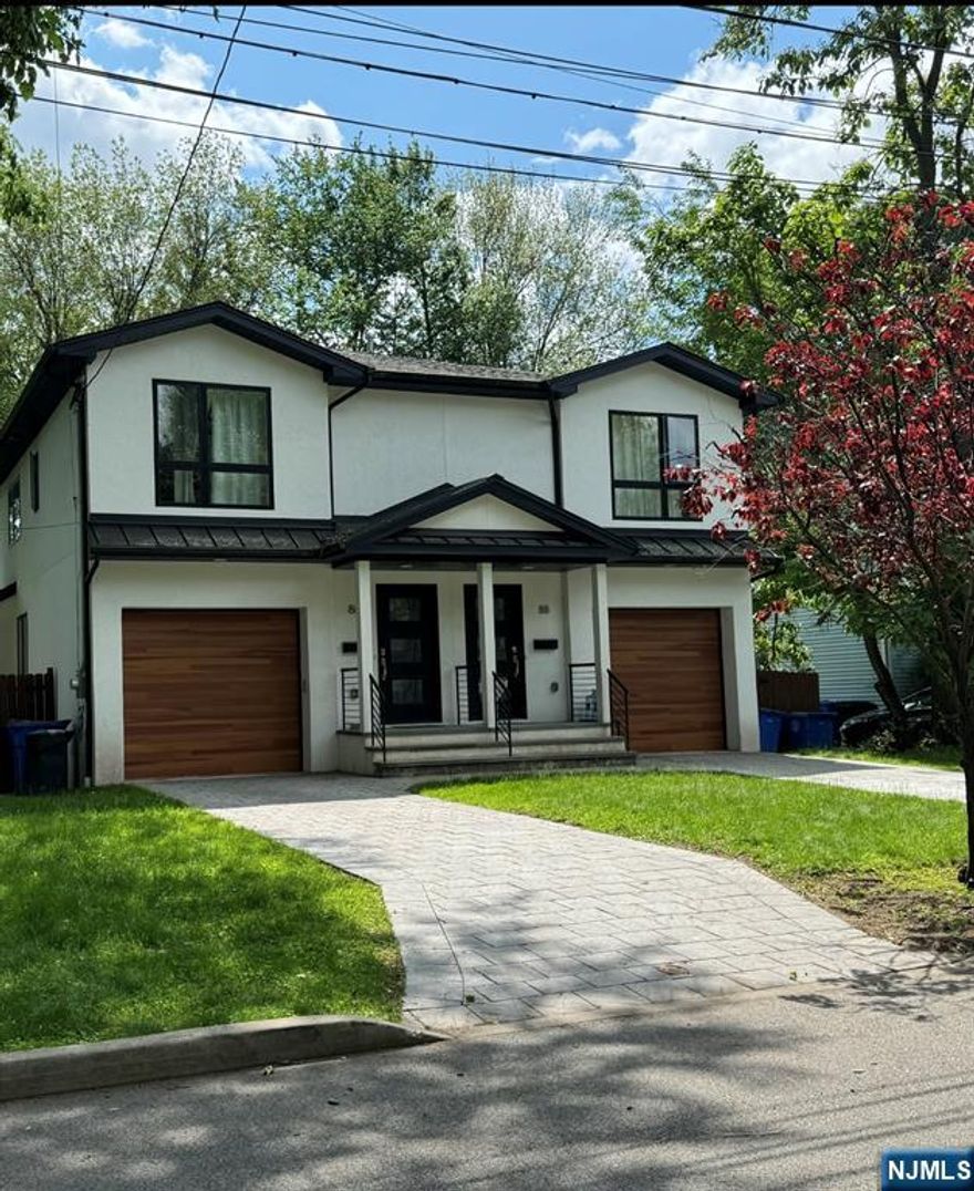 LOCATION-LOCATION-LOCATION--- No main road here!! Beautiful, NEWLY UPDATED HOME, (LEFT SIDE) in a picture-perfect, QUIET CUL-DE-SAC LOCATION right around the block from Tenafly High & Middle Schools. This stunning home has it all! 4 BEDROOMS, 3.5 BATHS, Central air, DESIGNER BATHROOMS, GOURMET KITCHEN with QUARTZ COUNTERTOPS & STAINLESS APPLIANCES, CUSTOM FLOATING STAIRCASES AND GLEAMING HARDWOOD FLOORS THROUGHOUT! SUN-LIT FINISHED BASEMENT W/GORGEOUS PORCELAIN FLOORS, Bedroom, Full Bath, attached garage, PLUS, a PRIVATE FENCED-IN YARD WITH A DECK! Ideally located close to the center of town, this home offers a perfect blend of modern style with high-end architectural details and a desirable location. Enjoy a wonderful Tenafly lifestyle and experience the robust downtown shopping/dining district while letting the kiddos excel to their maximum potential in the HIGHLY RANKED TENAFLY SCHOOL SYSTEM. All this and only minutes to the GWB & NYC, Public Transportation, Englewood Hospital and so much more! One small pet may be considered.