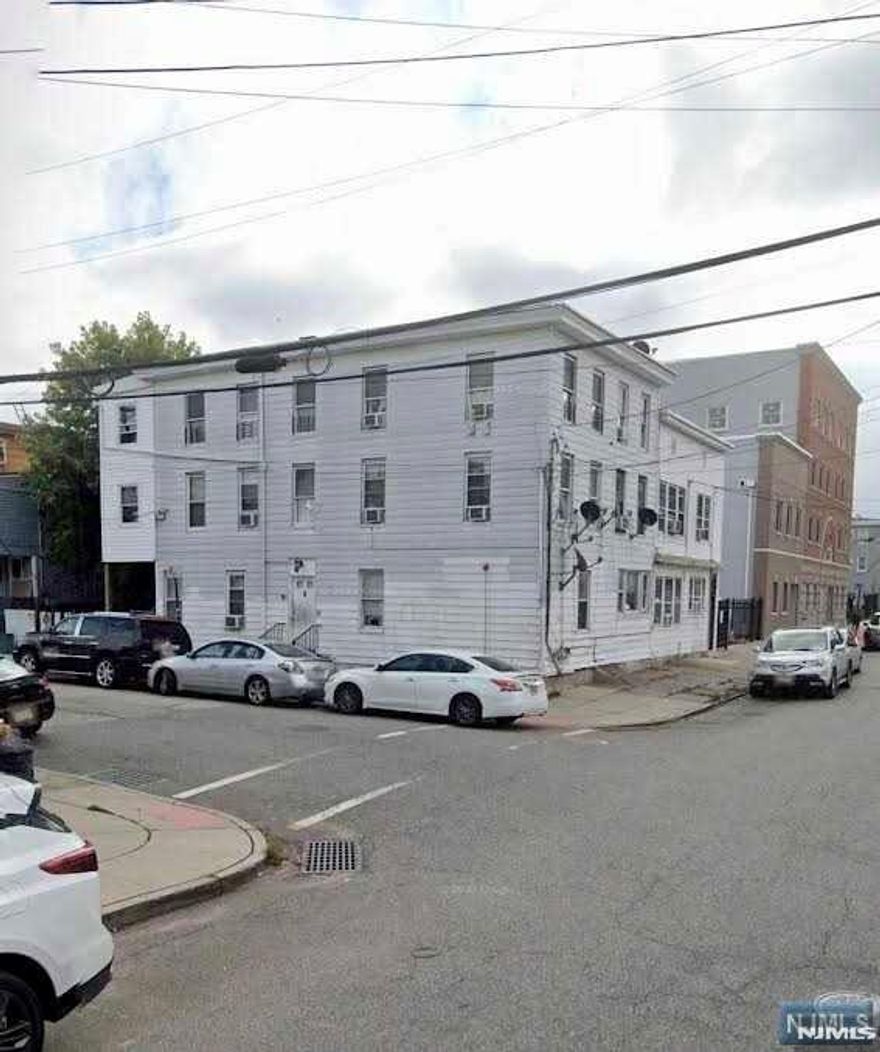 Amazing opportunity in the heart of downtown Paterson - 8-bedrooms and 6-full baths. (1x) 3-bedroom, (4x) 1-bedrooms & 1 studio apartment with off street parking. A true value add investment opportunity. Under market value rents grossing $92,454 with separate utilities yielding a 8.14% cap rate. All tenants are in good standing with leases in place. There is also a large basement with plenty of storage.