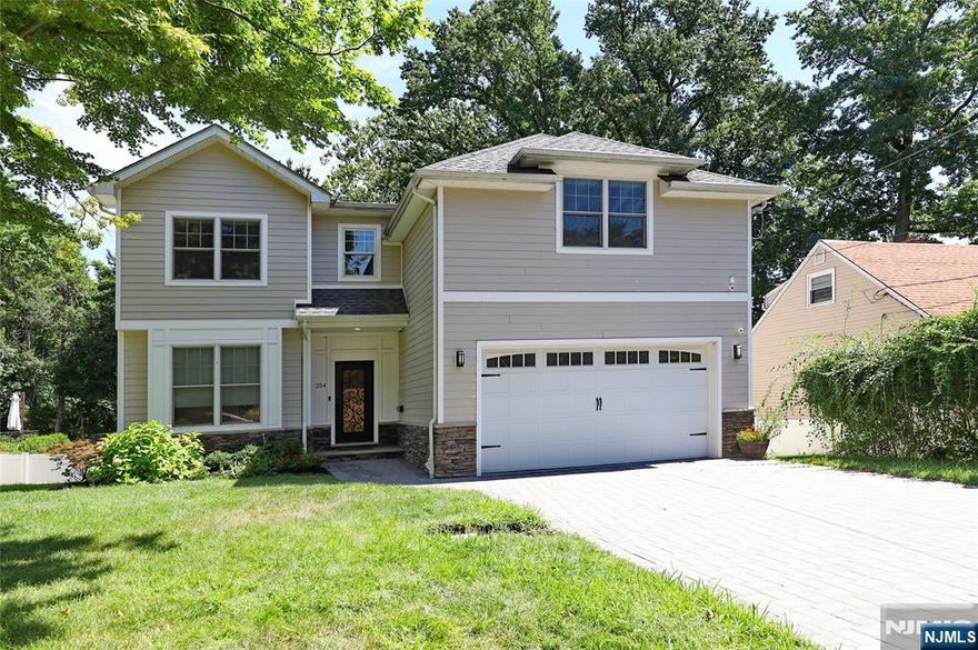 Welcome to this 9 years young 5-bedroom, 3.5-bath home offering sun-filled living space. Highlights include sparkling hardwood floors, inviting living and family rooms with fireplace, and a chefâ€™s kitchen with center island, top-tier appliances, and exquisite cabinetry. Upstairs, the primary suite features enviable wall-ins, while additional bedrooms and baths offer the same modern style and space. Smart upgrades include a 2-car garage, smart thermostats, heated bathroom floors, four-zone AC, generator ready & EV ready, and sprinkler systems. The private fenced backyard is an outdoor oasis with a palatial deck and BBQ hookup, while the fully finished basement adds a recreation area, bedroom with Full bath & sliding glass door to the back yard. Blue Ribbon schools, parks, and easy NYC access make this a must-see, destined to impress!