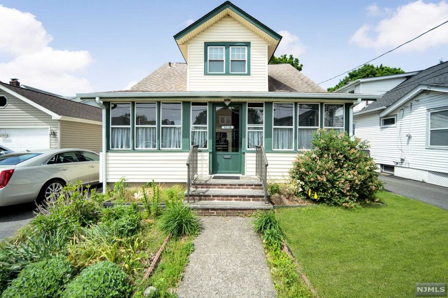 Well kept and lovingly maintained home with good sized rooms and a wonderful layout for all your needs. There are wood floors through much of the home and a spacious, open feeling. You enter into the welcoming, enclosed porch into the open concept living room/dining room both with hardwood floors. The first floor continues with a 4th bedroom/office and a large kitchen with hardwood floors and a breakfast room. Continue upstairs to find a large main bedroom and 2 ample sized additional bedrooms. An updated bath completes this floor. The basement is finished and functions as an additional family room. You are close to schools, downtown shopping, houses of worship and NYC transportation! This would be a great house to call "home"! Oil tank has been removed and driveway will be patched.