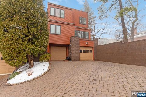 Photo of 55 Hidden Ledge Road, Englewood, NJ 07631 (MLS # 25041033)