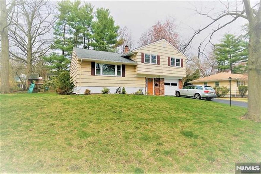 Very bright and airy Sugar Maple split level home in Demarest! Very conveniently located to NVD High School, Luther Lee Emerson elementary school. This home boasts all hardwood floors throughout, lots of LED recessed lights in every room, 2.5 baths with newer lightings, CAC, private backyard with new cement patio, close proximity to all schools, nature center and NYC bus stop. Demarest is one of the top rated school district.