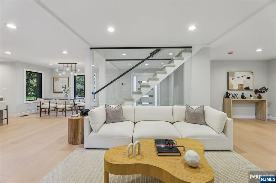 <B>CONTACT LISTING AGENT ANAT AT 201.341.4765 </B>Exquisite East Hill Living at Its Finest! Welcome to 29 Woodland Park Drive, an exceptional residence located in Tenaflyâ€™s prestigious East Hillâ€”fully renovated and expanded to perfection. This luxurious home boasts 6 spacious bedrooms and 5 brand-new, designer bathrooms, including a private first-floor ensuite ideal for guests or extended family. Step into a showstopping, imported high-end kitchen featuring Sub-Zero and Bosch appliances, elegant finishes, and sleek modern cabinetry. Wide-plank hardwood floors run throughout, adding warmth and sophistication. The finished lower level includes a full bedroom and bath, perfect for flexible living. With stucco exterior curb appeal, first-floor laundry, and a layout designed for todayâ€™s lifestyle, this home is just steps from top-rated schools, houses of worship, and NYC transit. This is more than a homeâ€”itâ€™s a lifestyle upgrade in one of Tenaflyâ€™s most sought-after neighborhoods.