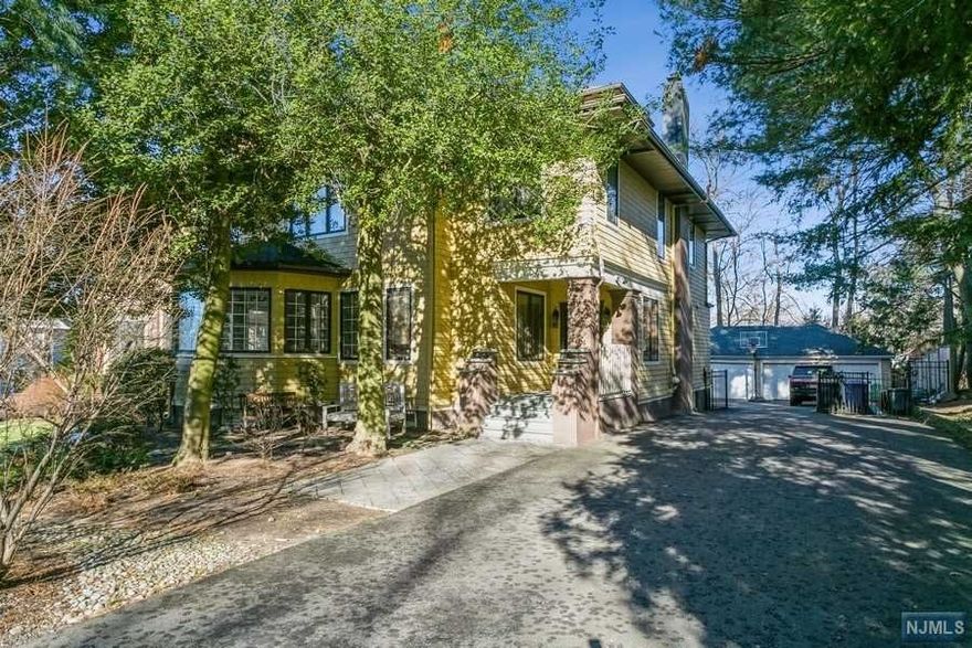 Set on over half an acre, this gem on Englewood's East Hill is a perfect marriage of old and new - plenty of charm, yet totally updated. First floor has super high ceilings and tons of large windows throughout. Kosher kitchen was gut renovated, high end w/ wolf appliances, sprawling island, 2 sinks, 2 dishwashers, walk in pantry and plenty of cabinet space. Leading off the kitchen, formal dining room is perfect for entertaining w/ its oversized dimensions, fireplace and bar area. Generous family room w/fire place and built ins, another living room, play room, office and powder room complete first floor. Second floor offers a primary suite w/ fireplace, 4 further generous bedrooms in addition to a laundry room and upstairs living room. Third floor offers another 4 bedrooms and full bath. Enjoy the backyard in the spring and summer, replete w/ newer pool, a fire pit area, a play gym area and a deck off the kitchen - you will not want to miss out on this beauty.