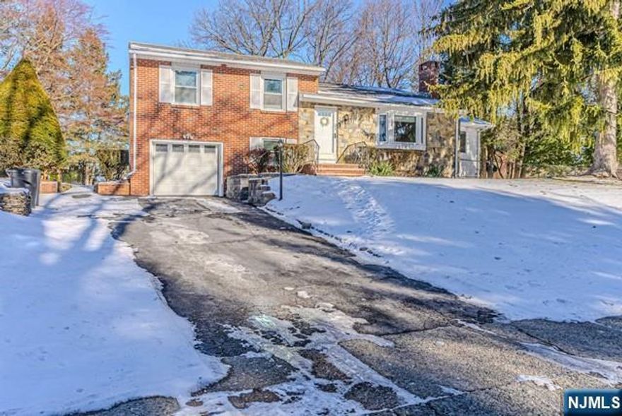 Sprawling and well updated split level with four levels of living, on a quiet street with nearby Elementary & Middle Schools. Step into a lovely living room with a fireplace (for decorative purposes only). Home consists of three bedrooms, 2 updated baths with 1 car garage. Spacious white eat in kitchen (addition) with peninsula and dining area with sliders to beautiful and inviting backyard. Walk out to the deck overlooking the patio with an IG pool in a completely fenced in yard! First floor also includes a family room, main bath and a butler pantry/office area. Step down to an office/den with laundry room nearby and access to backyard fun! Plenty of storage in basement. Wayne offers: excellent schools, Trader Joe's, Whole Foods, Boys & Girls, Y, PAL, James Roe Pool, Laurelwood Arboretum, Capt. Michael Kilroy Park +. LL requires NTN, Proof of Income, Pay Stubs & Renter Insurance Policy. Photos are from last tenant.