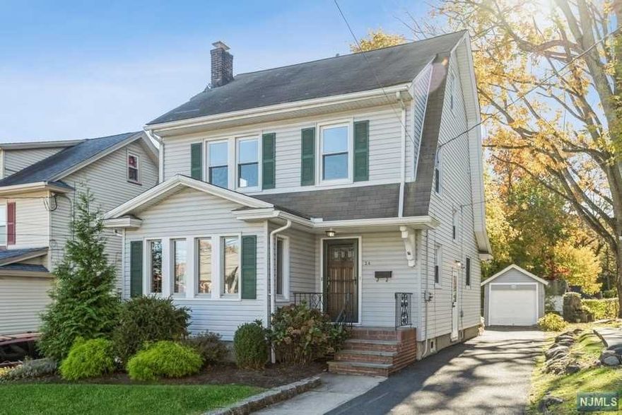 Spectacular home nestled on a quiet tree lined street with Amazing NYC Views. You'll be surprised by just how much room this home has to offer! Enjoy the natural light in almost every room. Original Chestnut moldings & doors give this home such charm. Ribboned hardwood flooring is under the 1st floor carpeting. Updated kitchen w/granite countertops. The home features 3 bedrooms on the 2nd floor, and a spacious 4th bedroom/leisure room on the 3rd floor with magnificent views. Enjoy your morning coffee on the deck (w/views of NYC) or in the Bonus Sun Room. Potential for full bath in basement. New Boiler & Water Heater. Walking distance to the Eagle Rock Reservation. Close to Montclair for shopping, theatre, museums & dining. DeCamp 66 Bus & Jitney for NYC commuting options are close by. Close to highways, 280, 80. GSP. 15 miles west of Midtown NY. Fireplace to be sold As Is. No known issues.