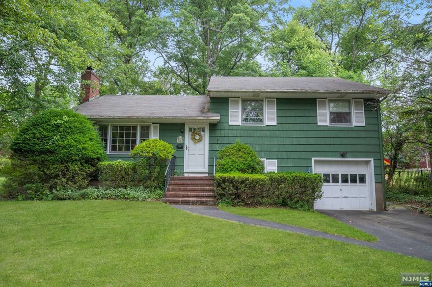 Welcome to this lovingly maintained 3 bedroom, 1 and a half bath split level in the desirable Packanack Lake section of Wayne. The main living level features a spacious living room with a wood burning fireplace, formal dining room and eat in kitchen. Ground level offers a family room, office space perfect for working at home and a half bath. The basement has plenty of space for storage and the potential to be finished. Additional features include a new forced air heating system, hardwood floors, 1 car attached garage and beautiful back yard. Enjoy swimming, boating and all the amenities Packanack Lake has to offer!