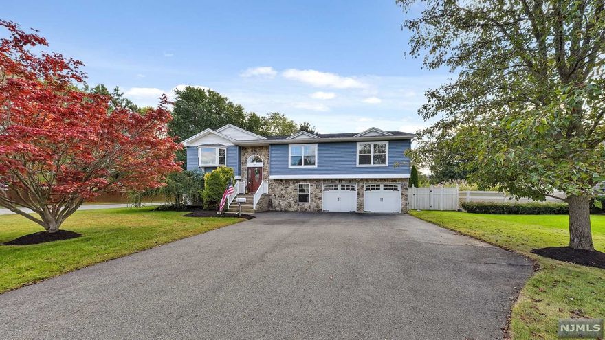 Nestled in one of the most sought after areas in the community awaits this anything but typical home that has been transformed and is sure to please! Consuming a large corner lot this extended home is anchored by a massive gourmet kitchen complete w/ center island, custom cabinets, wolf range/oven & other high end appliances...this was made for entertaining! All the BR's are of generous size including the Master Suite w/ Jetted Tub & Large Walk-In Closet. The Ground Floor offers many opportunities for additional living space w/ nearly 1,000 square feet of finished space including a wonderful wood burning stove! Outside recreation is a breeze from the maintenance free deck or lower patio leading to the massive in-ground, all day in the sun pool! Located just minutes from the Golf Course, High School & Hospital make for an amazing spot known as HOME! Schedule your private tour today!