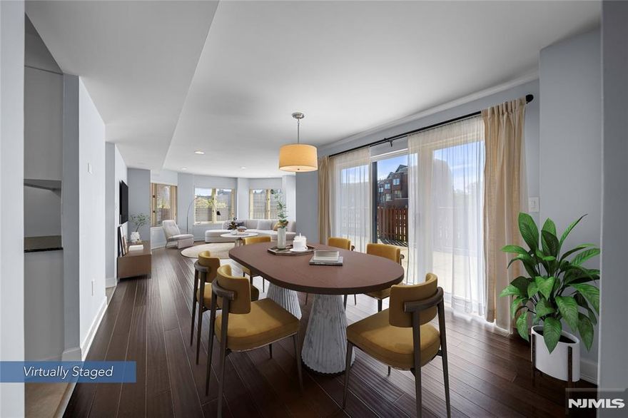 Welcome to 301 Ellery Court in the highly sought-after gated community of Independence Harbor! This beautiful southeast-facing corner unit offers 2 bedrooms, 2 bathrooms, and 1293 SF of bright, open living space. A rare private wrap-around patio provides the perfect setting for outdoor entertaining or quiet relaxation. Recent updates include newer stainless steel kitchen appliances, newer HVAC system, water heater and washer/dryer. This residence also features a private laundry room and two garage parking spaces. Enjoy riverfront living with 24-hour gated security, a swimming pool, tennis courts, clubhouse with gym, childrenâ€™s playground, dog park and direct access to the Hudson Riverfront Walkwayâ€”all just minutes from NYC!