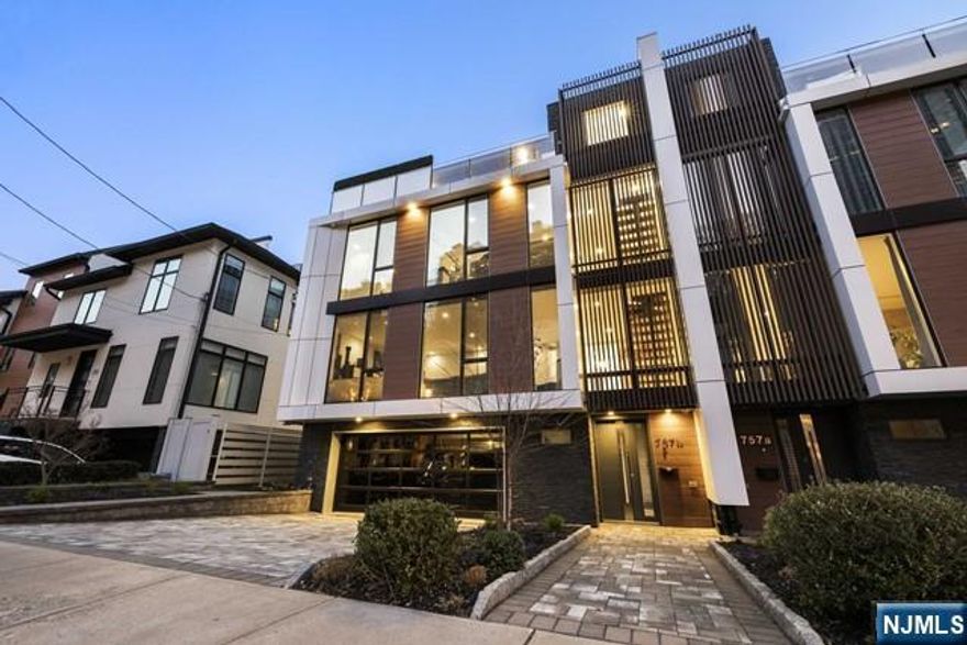 This beautiful contemporary duplex offered by Matt Perasso of Compass is unlike any others around. Extra wide (34"ft wide) interior adorned w/floor to ceiling windows and white accents throughout. Dramatic white natural stone bricks line the walls of the entire floating staircase. Highest grade everything from the wood flooring & appliances to the new boiler. No expense was spared by both the builder and this original owner. Recent upgrades from top to bottom include outfitting for commercial Restaurant level cooking yet keeping to the integrity of residential living. Beautiful white quartz Counter tops w/underlighting in both kitchens: one main kitchen below and a Summer kitchen above for the spectacular "sky lounge", w/a wrap around terrace, complete w/a hedge panel' privacy wall. Enjoy breathtaking views of the Hudson and Manhattan, while entertaining or relaxing in the incredible atmosphere, unique to this home.