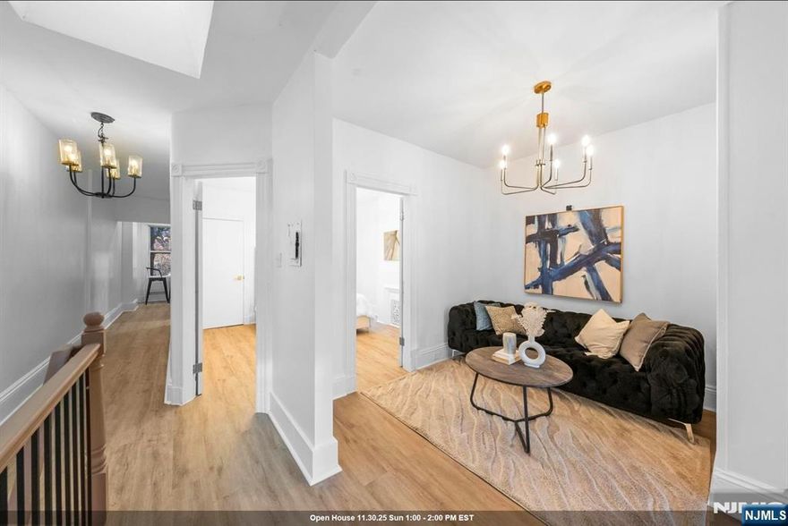 Live in smart elegance. A multi family brownstone all brick, filled with character, charm, and endless income opportunity. Nestled on one of Bergen-Lafayetteâ€™s most energetic blocks, this home offers true flexibility: live comfortably while generating rental income, or create the perfect multi-generational setup. Each unit offers high ceilings, tons of character, south-facing sun-filled rooms, and modern finishes. The 1st floor 1bedroom, 1bathroom apartment features a deck off the kitchen leading directly to the backyard. The 2nd floor unit offers 3 bedrooms and 1 bathroom with great natural light. The bonus unit on the garden level provides private front and back entrances, a 1bedroom suite with kitchen and bathroom, plus direct access to the backyard. Commute with ease; Light Rail, NJ transit, multiple bus lines are within walking distance. You're surrounded by parks, cafés, shops, and continuous neighborhood growth.